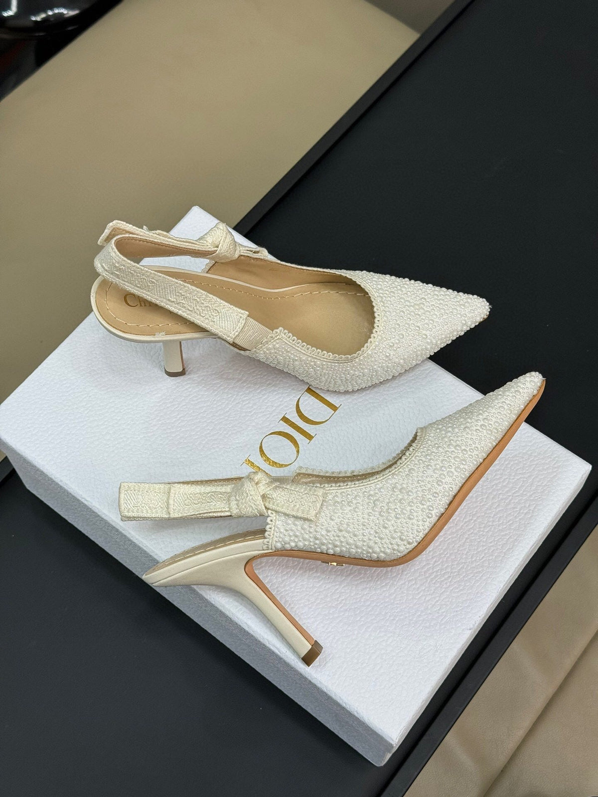 J'ADIOR POINTED TOE SLINGBACK PUMPS IN WHITE BEADED FABRIC