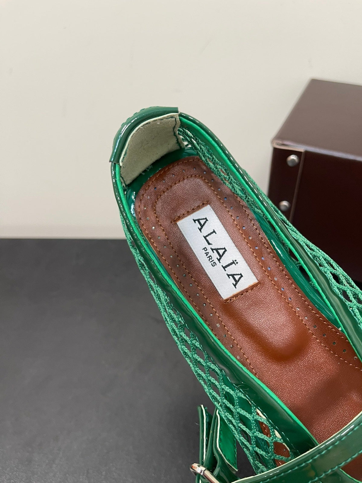 ALAIA BALLET FLATS IN COOL GREEN MESH FISHNET