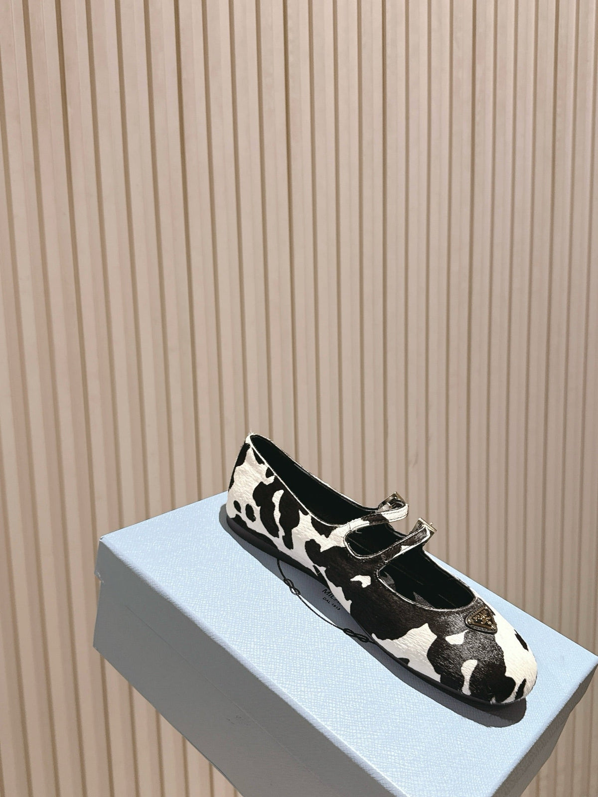 PRADA 25S CRYSTAL EMBELLISHED BALLERINA IN WHITE AND BLACK FUR
