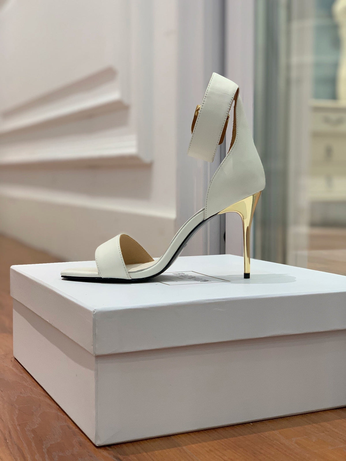 BALMAIN 25S THIN STRAP HIGH HEELS 105MM IN IVORY CALFSKIN GOLD HARDWARE