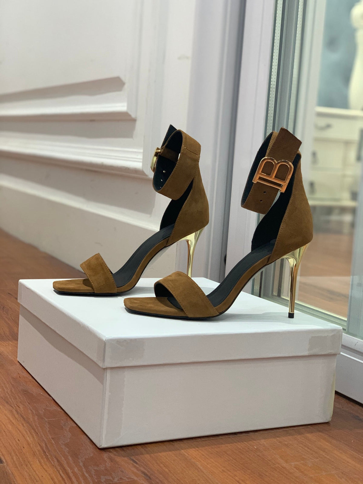 BALMAIN 25S THIN STRAP HIGH HEELS 105MM IN DARK BROWN SUEDE GOLD HARDWARE