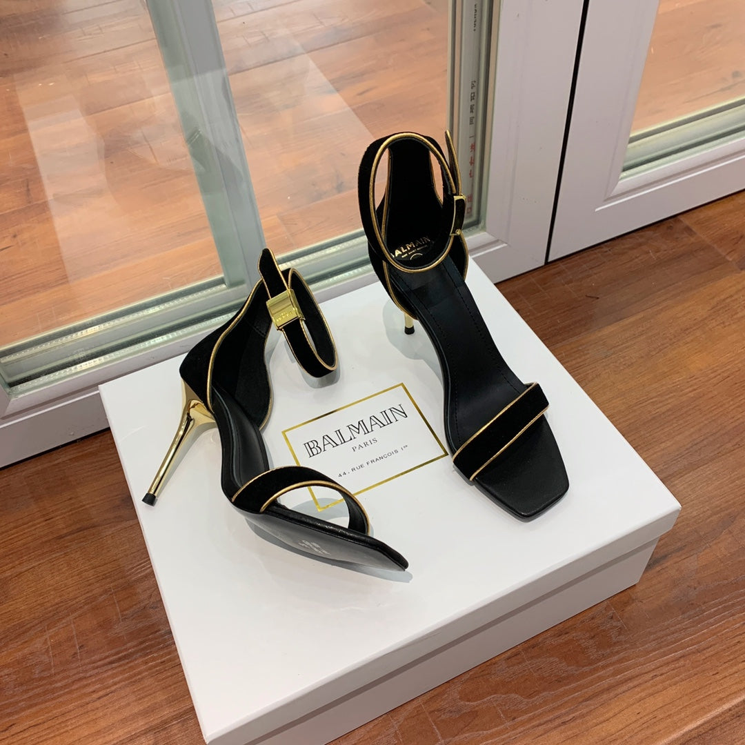 BALMAIN 25S UMA HEELED SANDALS 105MM IN BLACK SUEDE GOLD HARDWARE