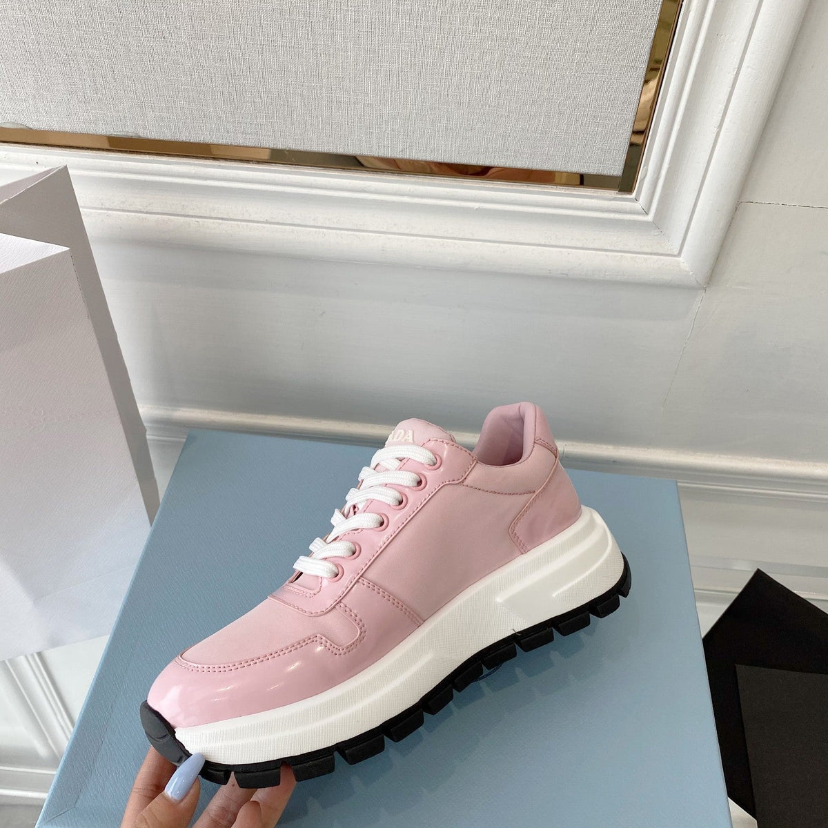 PRADA 25S THICK SOLE SNEAKER IN LIGHT PINK CALFSKIN AND CANVAS