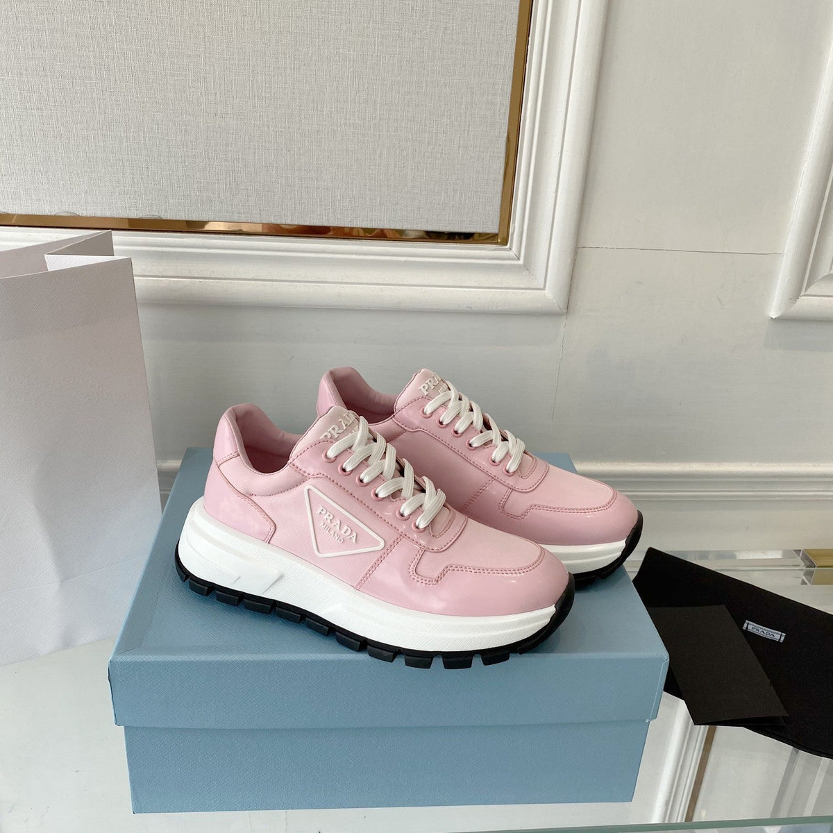 PRADA 25S THICK SOLE SNEAKER IN LIGHT PINK CALFSKIN AND CANVAS