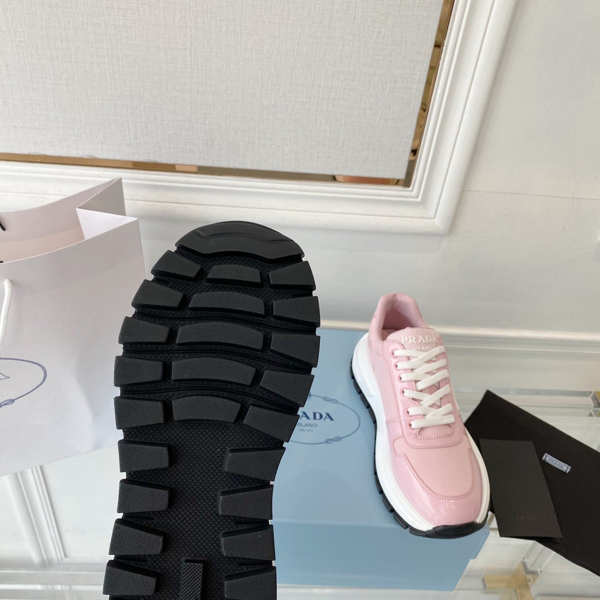 PRADA 25S THICK SOLE SNEAKER IN LIGHT PINK CALFSKIN AND CANVAS