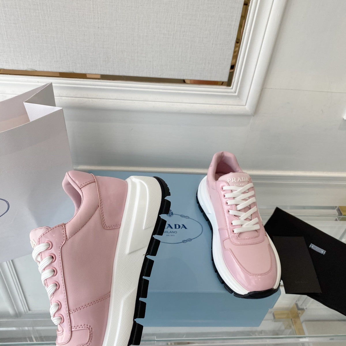 PRADA 25S THICK SOLE SNEAKER IN LIGHT PINK CALFSKIN AND CANVAS