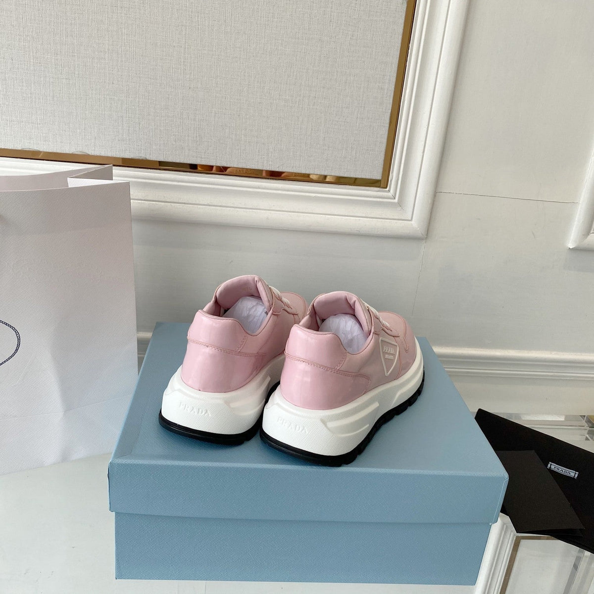 PRADA 25S THICK SOLE SNEAKER IN LIGHT PINK CALFSKIN AND CANVAS