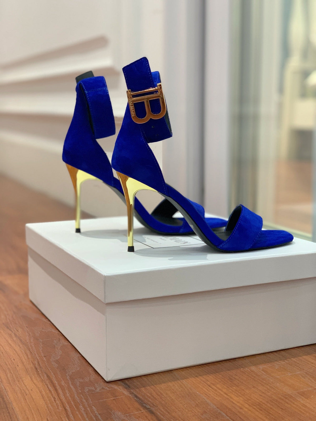 BALMAIN 25S THIN STRAP HIGH HEELS 105MM IN DARK BLUE SUEDE GOLD HARDWARE