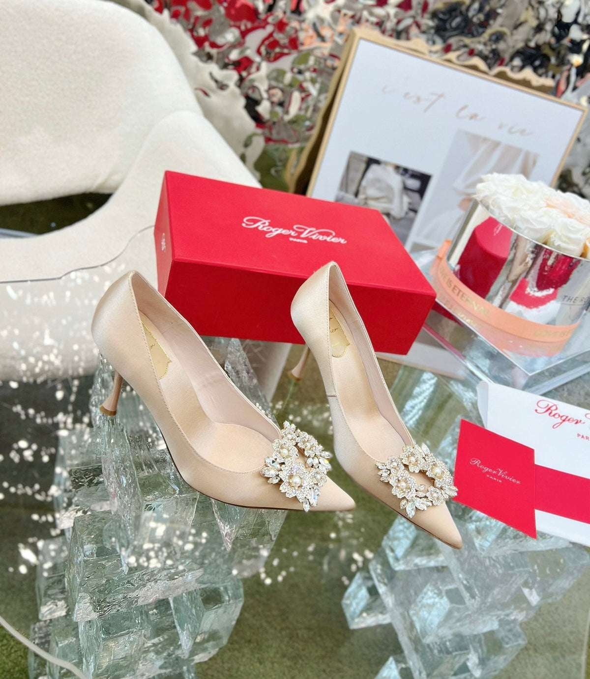 EFFLORESCENCE POINTED-TOE PUMPS IN NUDE SATIN WITH CRYSTAL BUCKLE