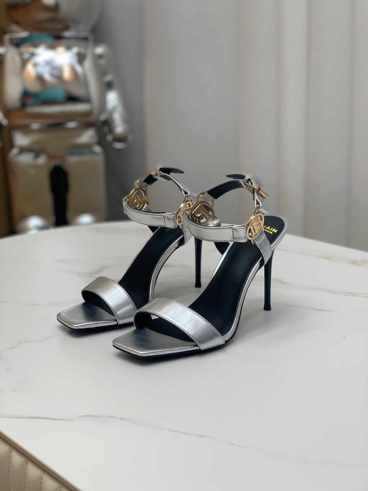 BALMAIN 25S HIGH HEELS WITH B METAL DETAIL 95MM IN SILVER CALFSKIN