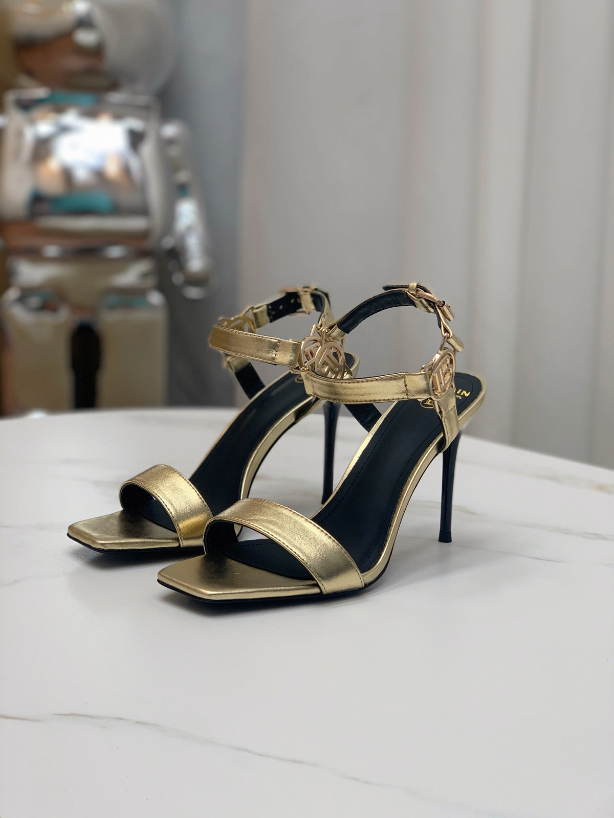 BALMAIN 25S HIGH HEELS WITH B METAL DETAIL 95MM IN GOLD CALFSKIN