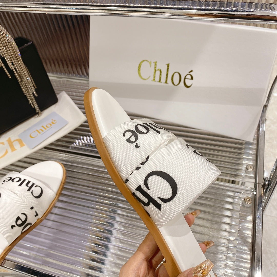 CHLOÉ WOODY SLIPPER IN WHITE MIX BLACK CANVAS