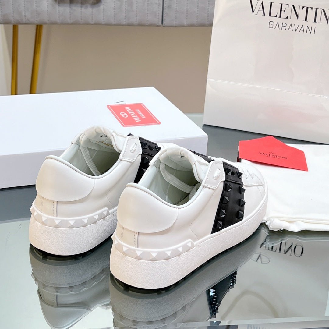 VALENTINO 25S GARAVANI ROCKSTUD UNTITLED STUDDED SNEAKERS IN WHITE MIX BLACK LAMBSKIN