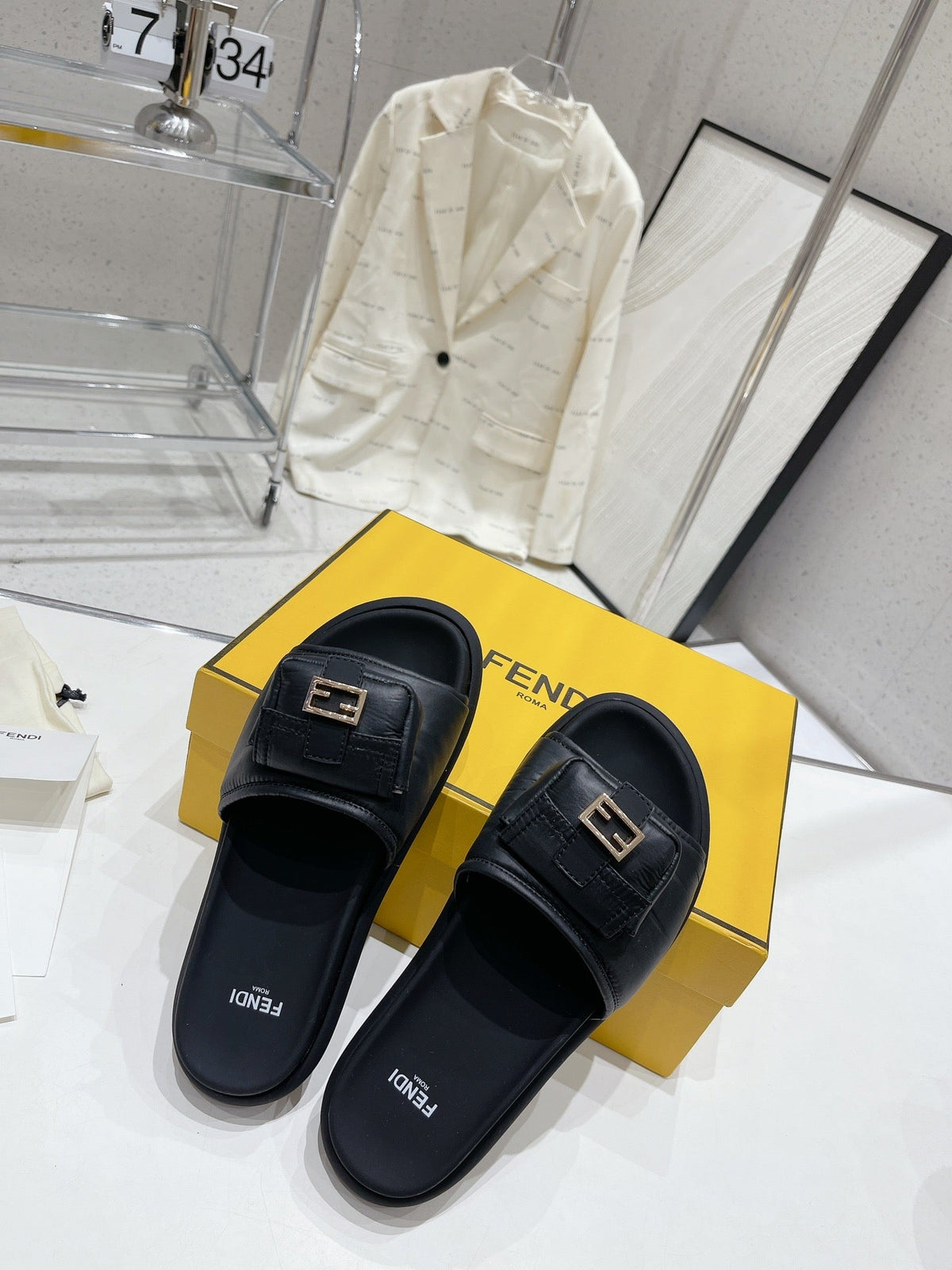 FENDI BAGUETTE SLIPPERS IN BLACK LAMBSKIN WITH GOLD HARDWARE