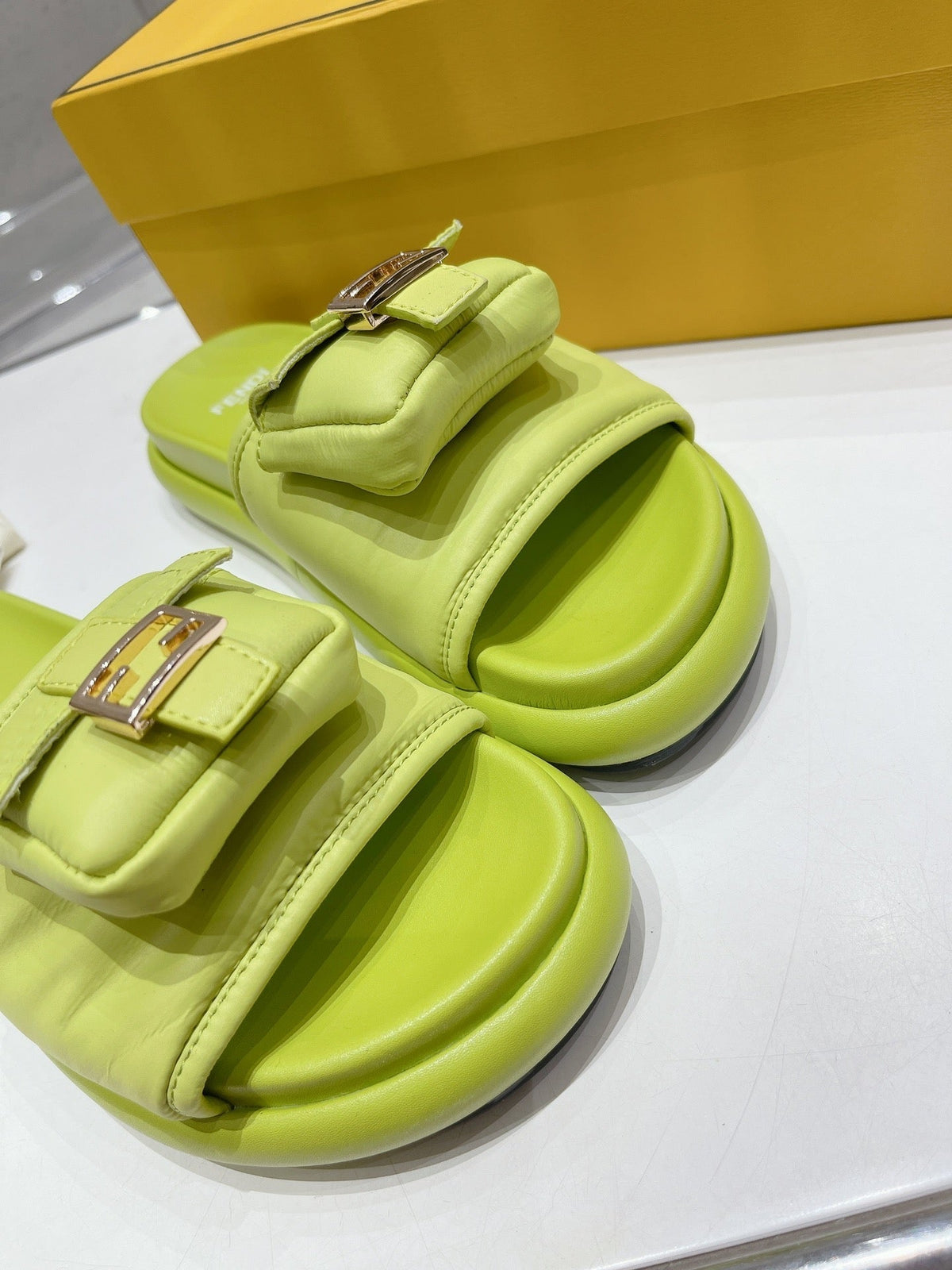 FENDI BAGUETTE SLIPPERS IN PEAR GREEN LAMBSKIN WITH GOLD HARDWARE