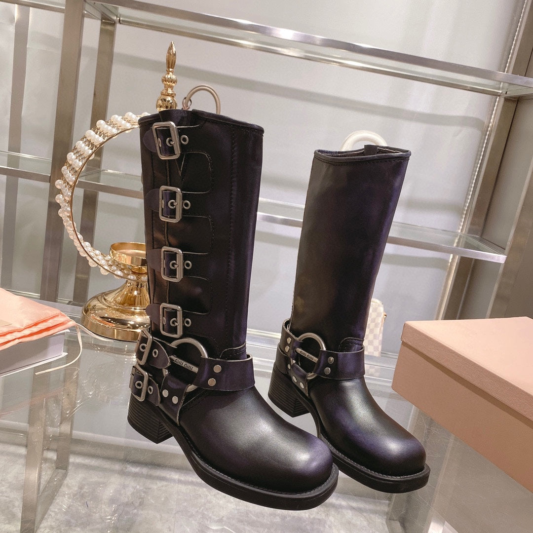 THICK-SOLED BUCKLE BOOTS IN BLACK CALFSKIN
