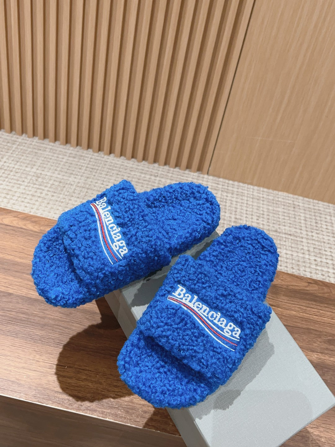 FURRY SLIDES IN COBALT BLUE CURLY SHEARLING
