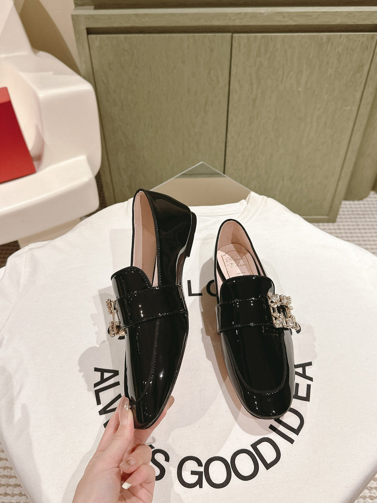 MINI BROCHE VIVIER BUCKLE LOAFERS IN BLACK PATENT CALFSKIN