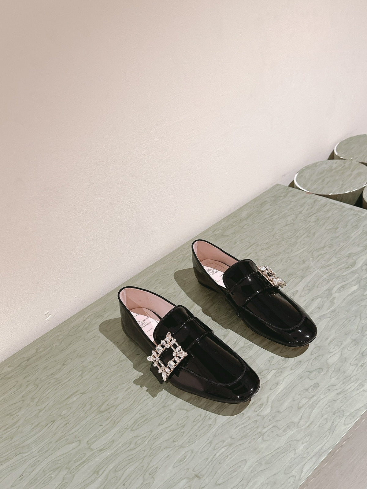 MINI BROCHE VIVIER BUCKLE LOAFERS IN BLACK PATENT CALFSKIN