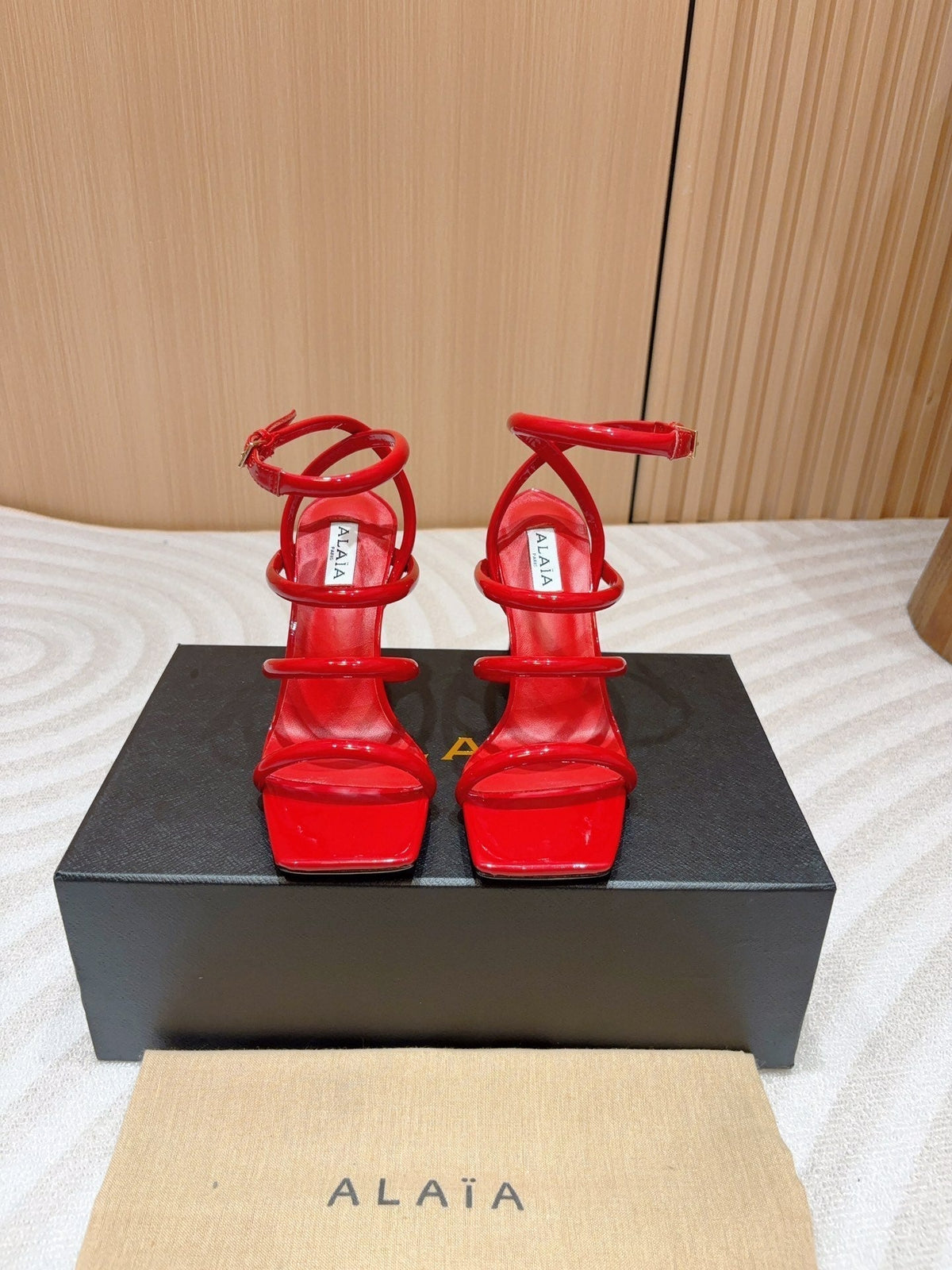 ALAIA THREE-STRAPS HIGH HEEL SANDALS IN CHERRY RED PATENT LAMBSKIN