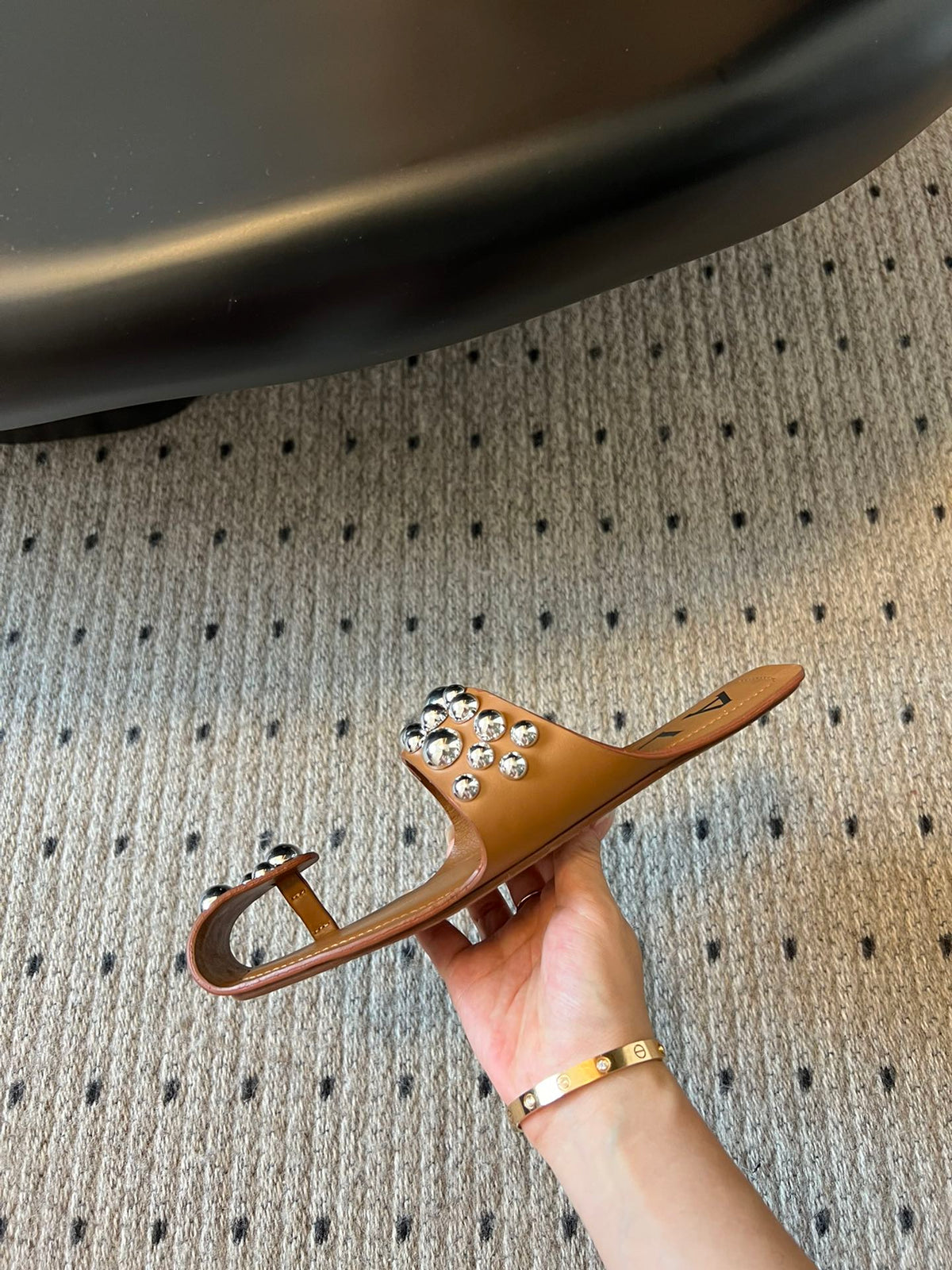 ALAIA FOLDED FLAT MULES WITH SPHERES ON COPPER BROWN CALFSKIN