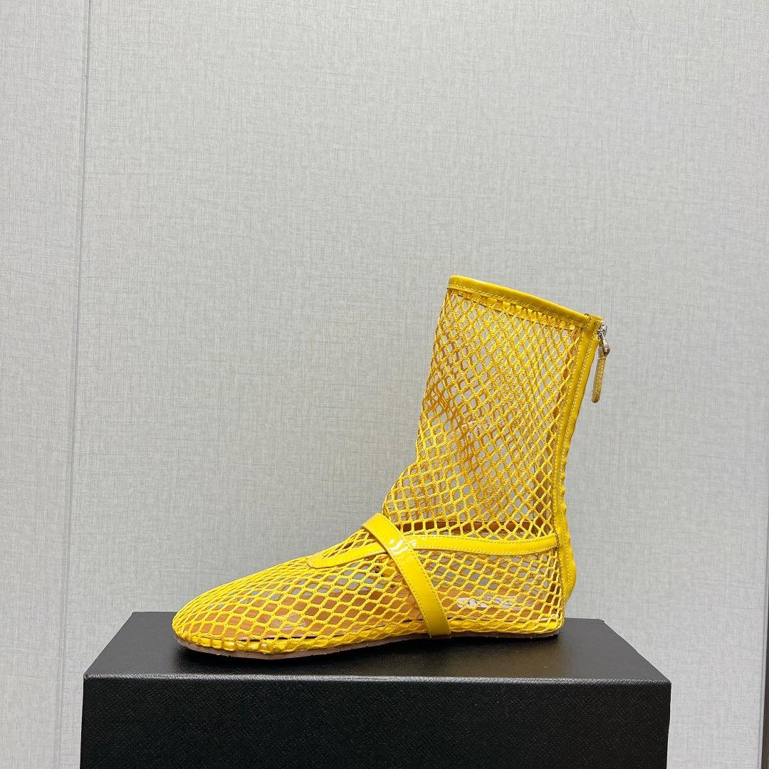 ALAIA SHORT BOOTS IN LEMON YELLOW MESH FISHNET