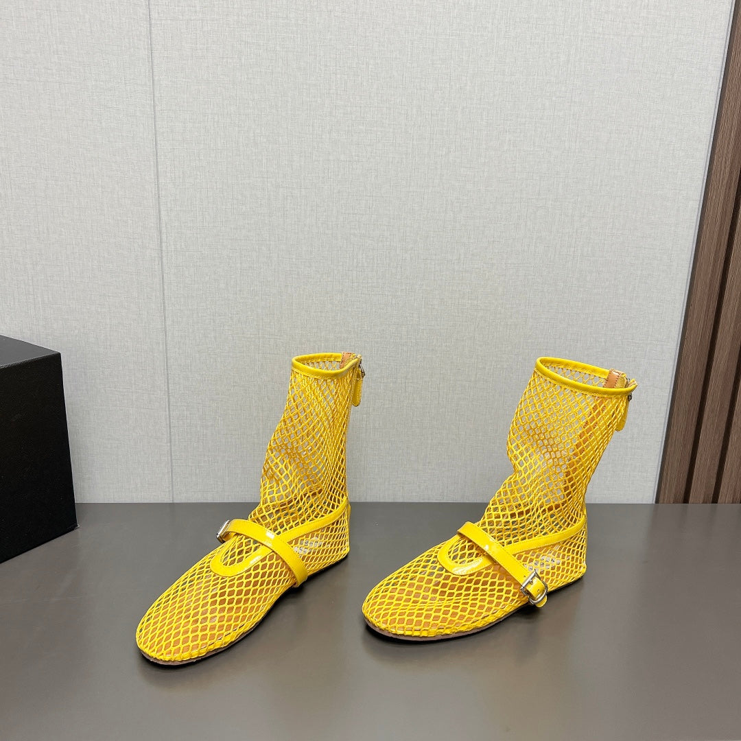ALAIA SHORT BOOTS IN LEMON YELLOW MESH FISHNET