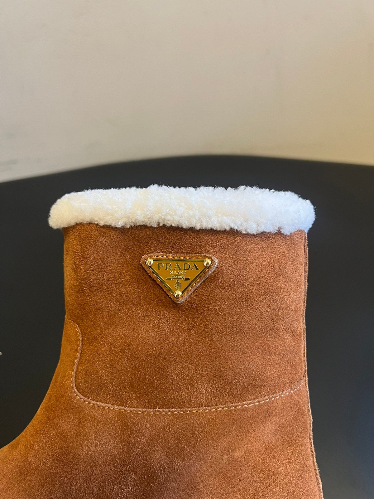 PRADA 25S ANKLE BOOTS 40 MM IN BROWN SUEDE SHEARLING-LINED