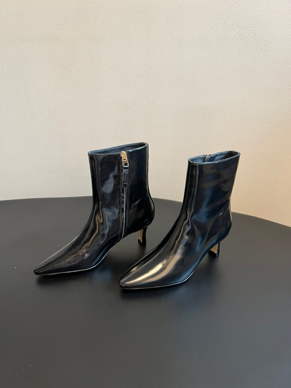 BOTTEGA VENETA 26S POINTED-TOE BOOTS 50 MM IN BLACK CALFSKIN