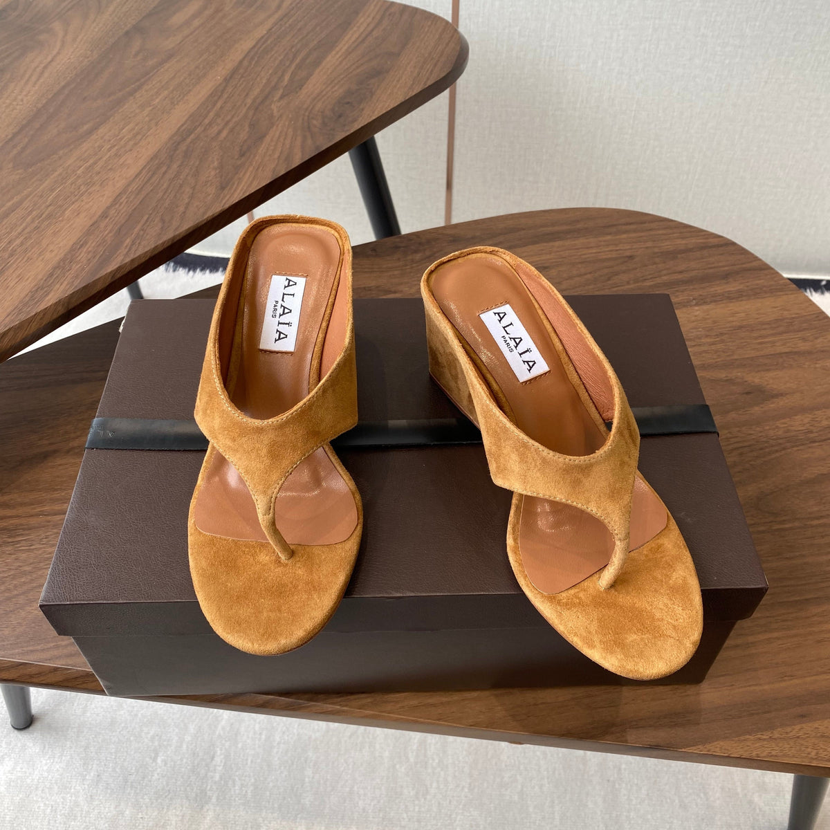 ALAIA WEDGE THONG SANDALS 25S IN BURNT ORANGE SUEDE