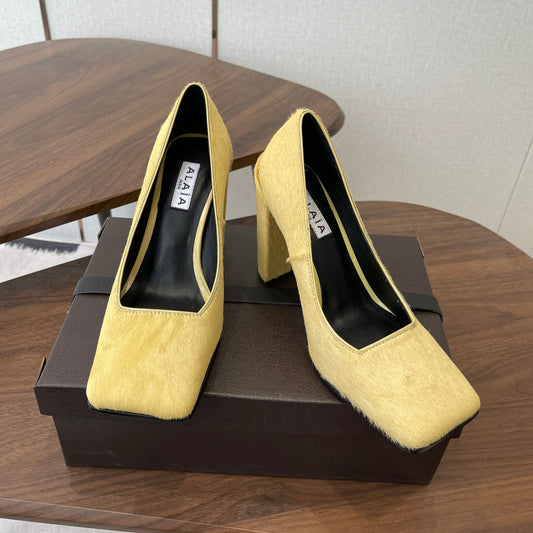 ALAIA 26S SQUARE-TOE HIGH HEELS 95 MM IN YELLOW PONY HAIR