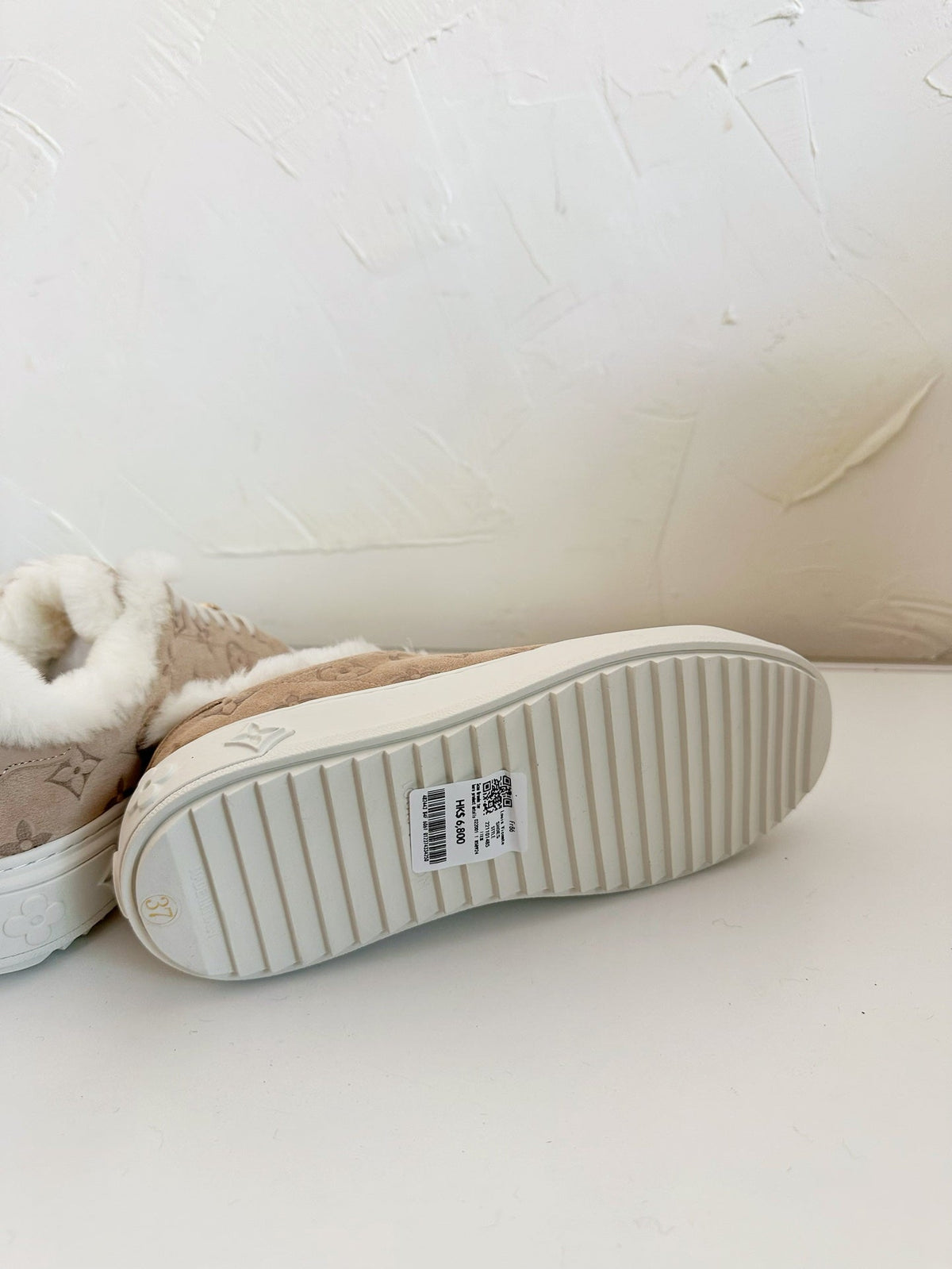 TIME OUT SNEAKER IN DESERT BROWN MONOGRAM EMBOSSED SUEDE WITH FLEECE LINING