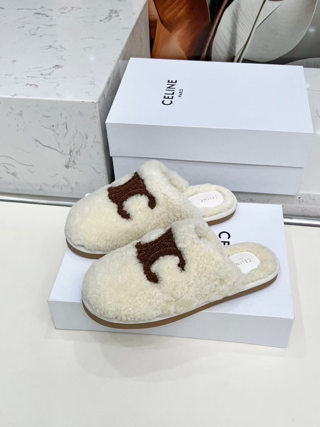 CELINE 25S GEORGIA SLIDE IN SHEARLING IN IVORY