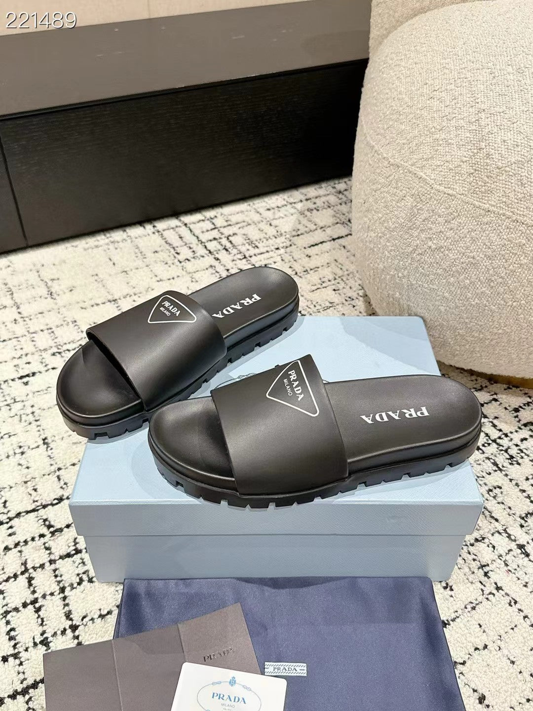PRADA 25S RUBBER SLIDE IN BLACK CALFSKIN WITH LOGO