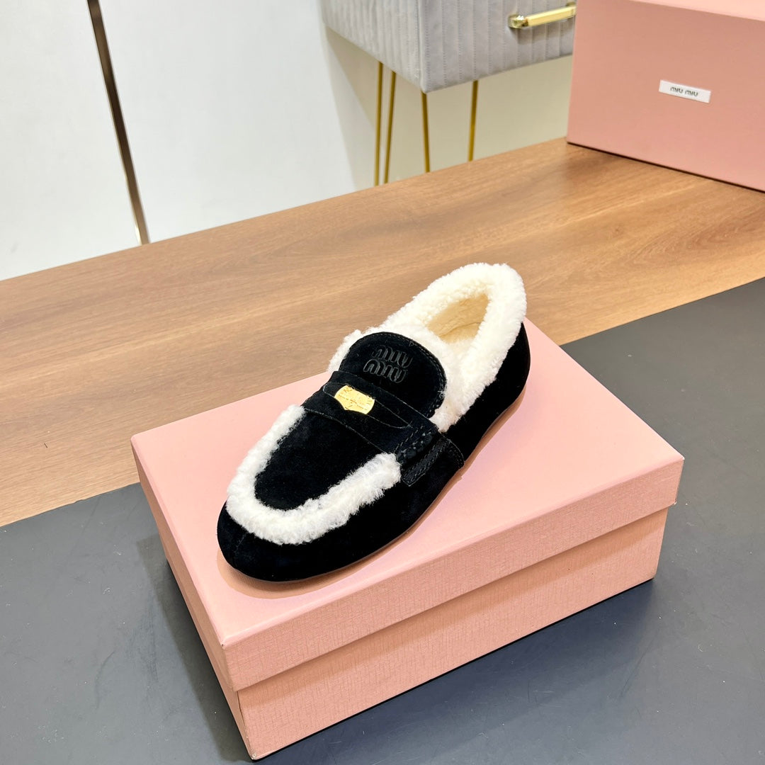 LOAFERS IN BLACK SUEDE AND WHITE SHEARLING TRIM