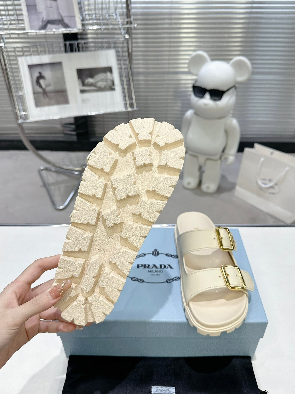 PRADA 25S STRAP SLIDES 30MM IN CREAM CALFSKIN GOLD HARDWARE