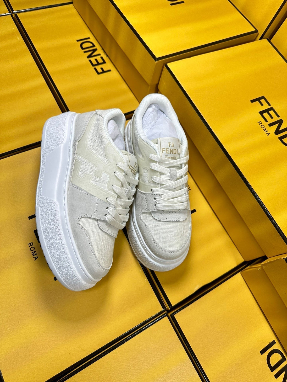 FENDI THICK-SOLDED SNEAKER IN WHITE SUEDE AND MONOGRAM FABRIC
