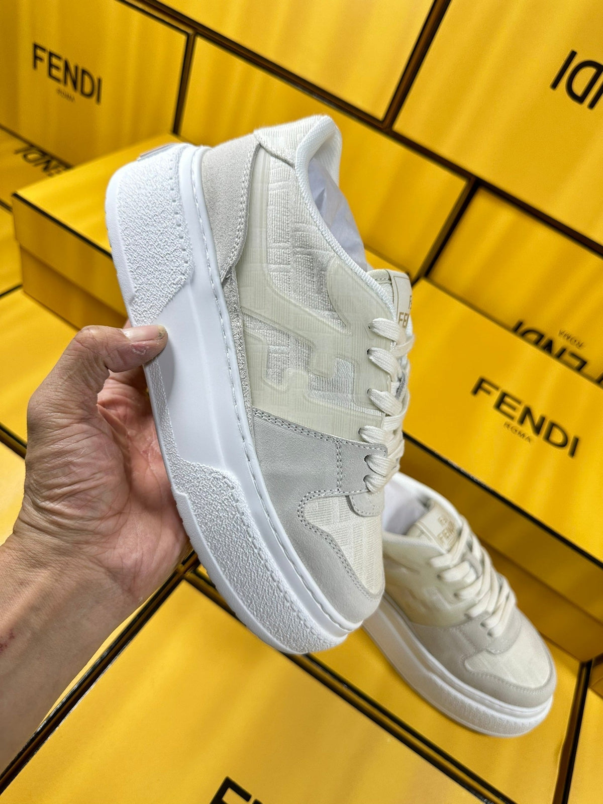 FENDI THICK-SOLDED SNEAKER IN WHITE SUEDE AND MONOGRAM FABRIC
