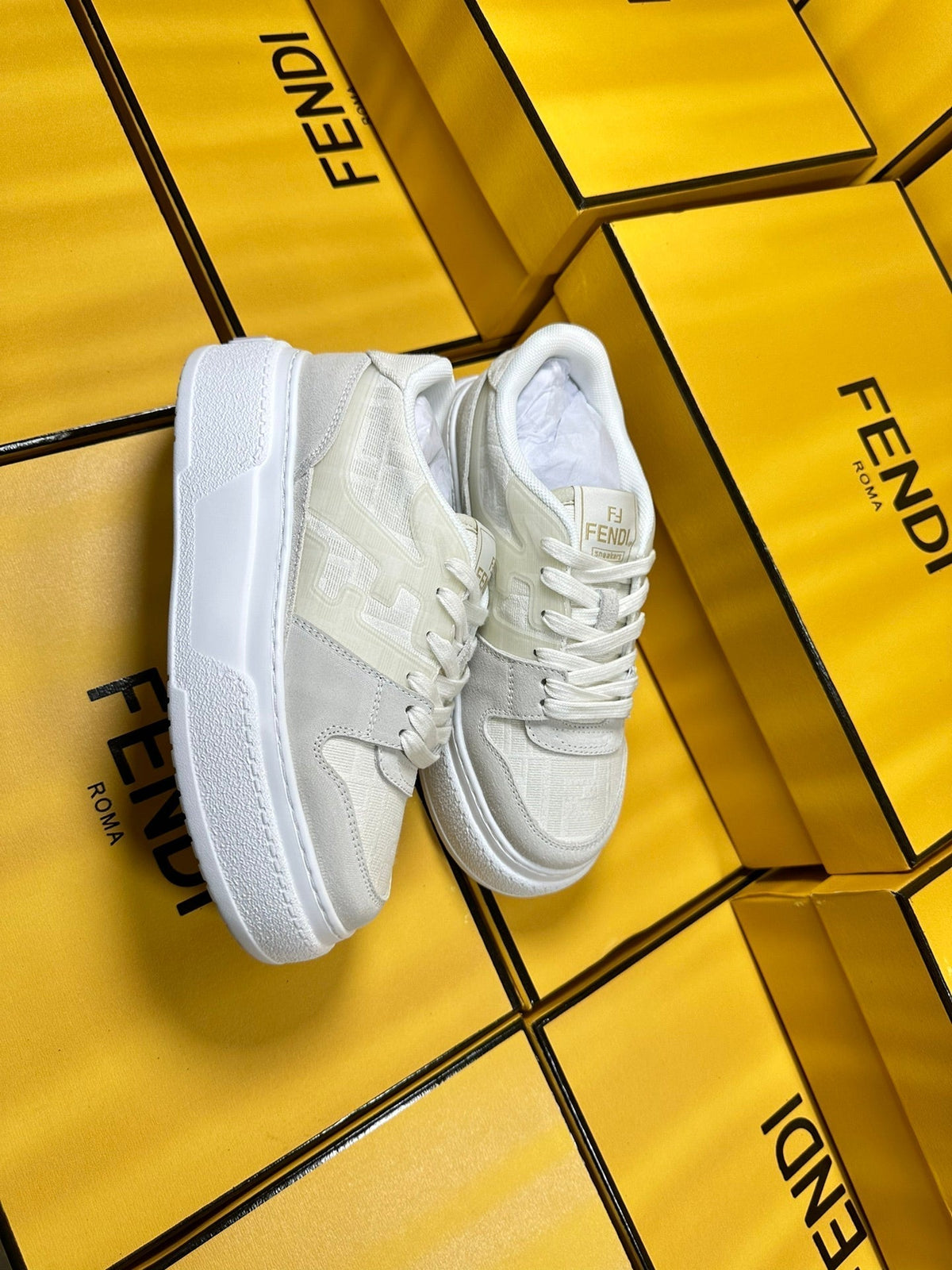 FENDI THICK-SOLDED SNEAKER IN WHITE SUEDE AND MONOGRAM FABRIC