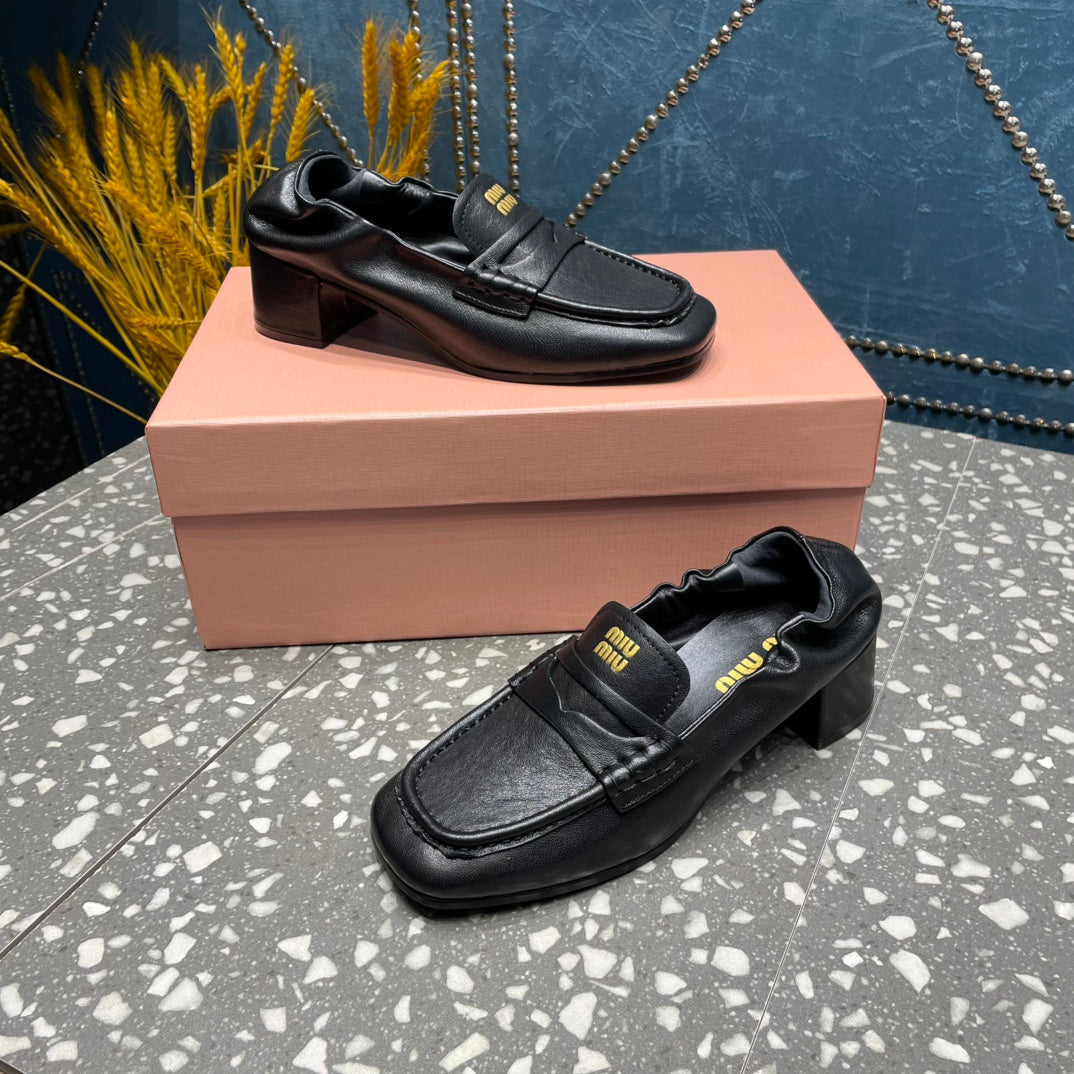 HIGH BROGUE LOAFERS IN BLACK LAMBSKIN