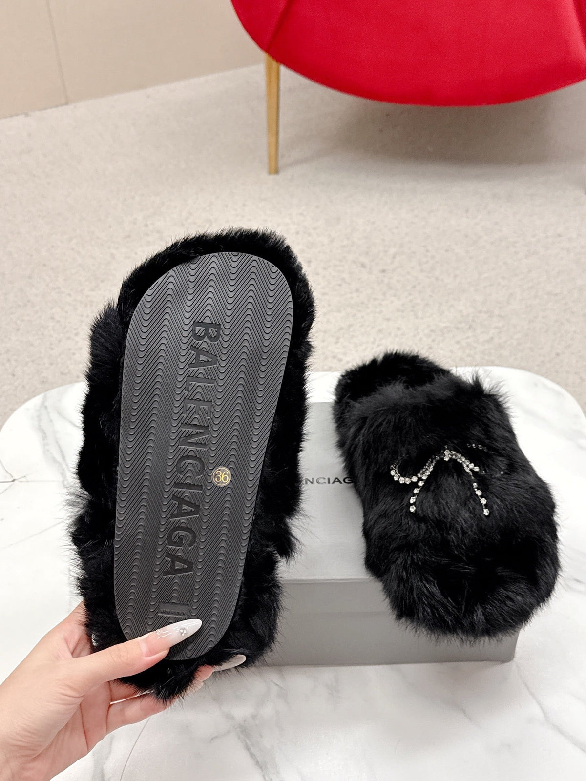 BALENCIAGA 25S SOFT FUR SLIPPERS IN BLACK FUR WITH RHINESTONE BOW