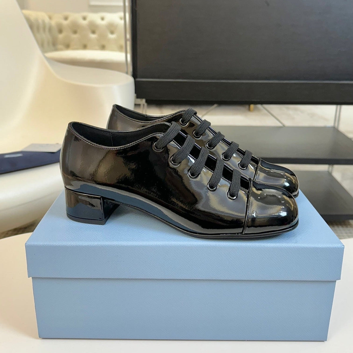 LACE-UP HIGH SHOES IN BLACK GLOSSY CALFSKIN
