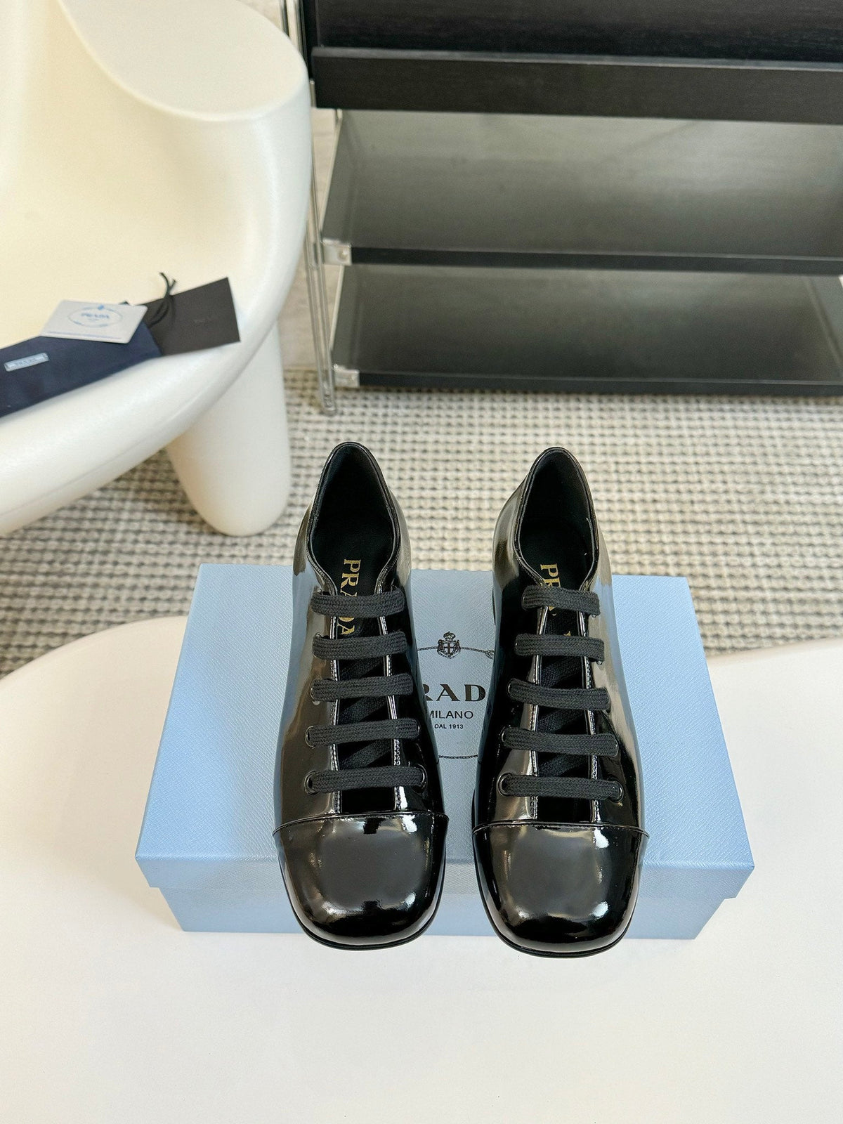 LACE-UP HIGH SHOES IN BLACK GLOSSY CALFSKIN