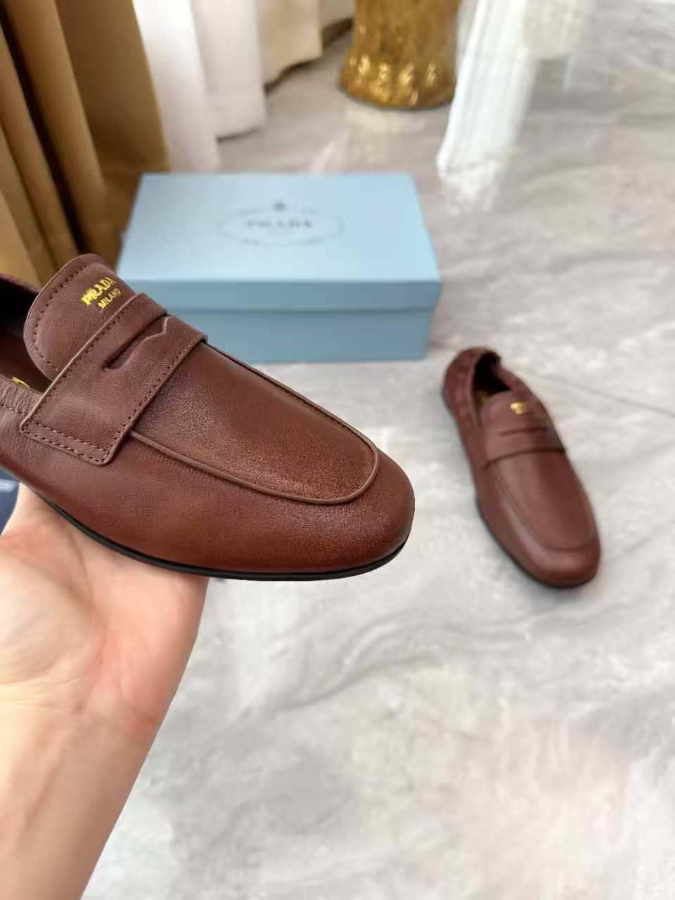 PRADA 25S LOAFERS IN BROWN CALFSKIN