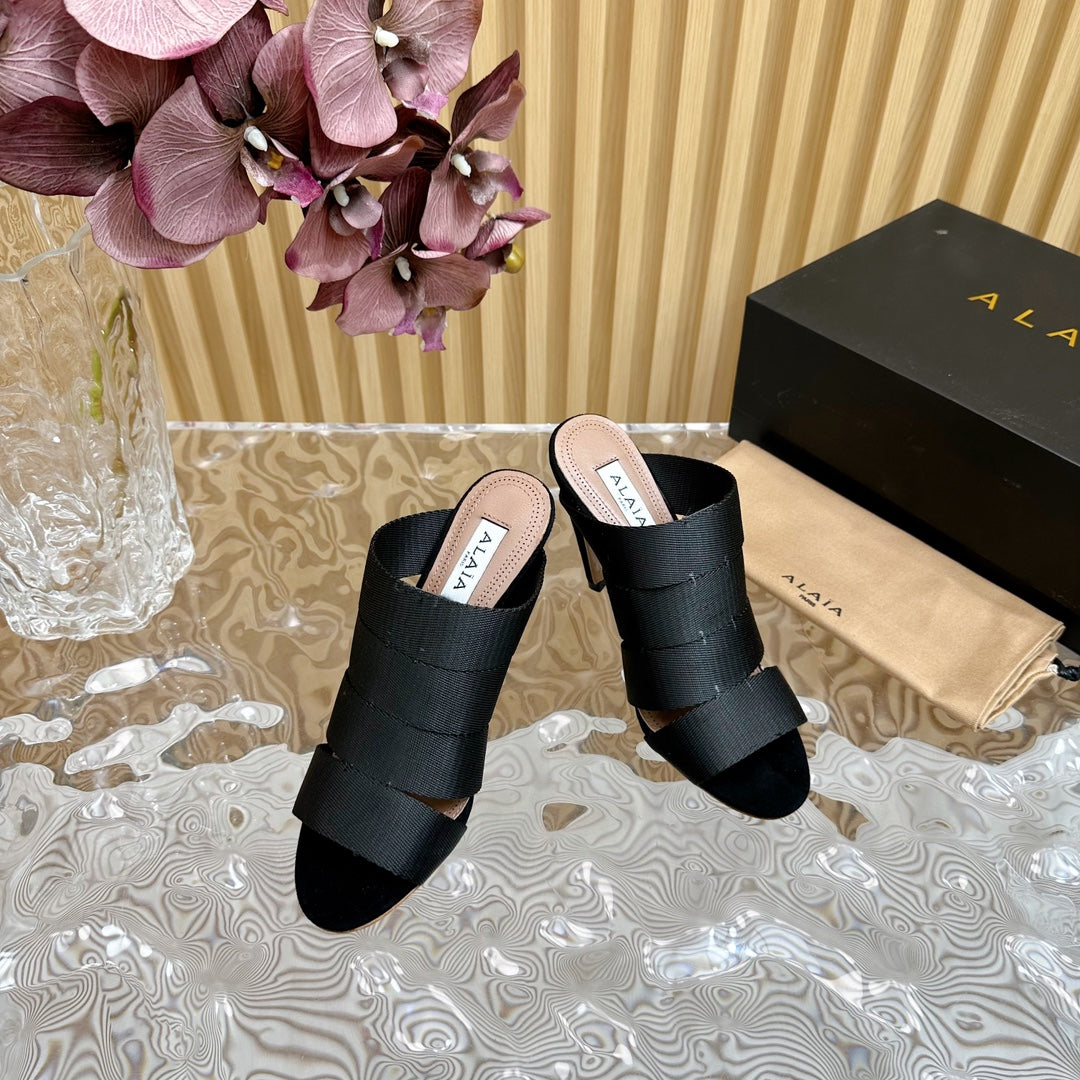 ALAIA ELASTIC CAGE MULE SANDALS IN BLACK WOVEN STRAP AND LAMBSKIN