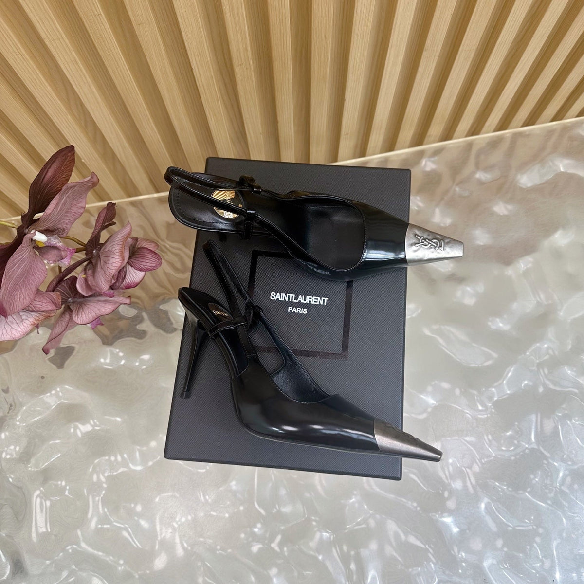 YSL 25S HIGH-HEEL SLINGBACKS 105 MM IN BLACK SHINY LAMBSKIN AND SILVER HARDWARE