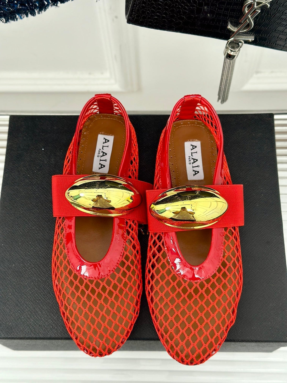ALAIA MARY JANE SHOES IN CHERRY RED MESH WITH GOLD HARDWARE
