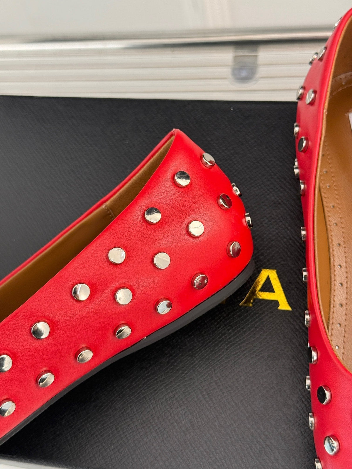 STUD-EMBELLISHED BALLET FLATS IN CHERRY RED CALFSKIN