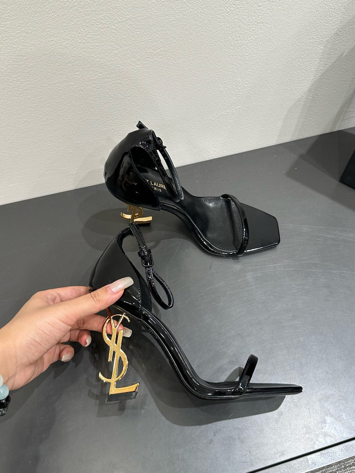 YSL HEELED SANDALS 25S 105 MM IN BLACK GLOSSY LAMBSKIN WITH GOLD HARDWARE