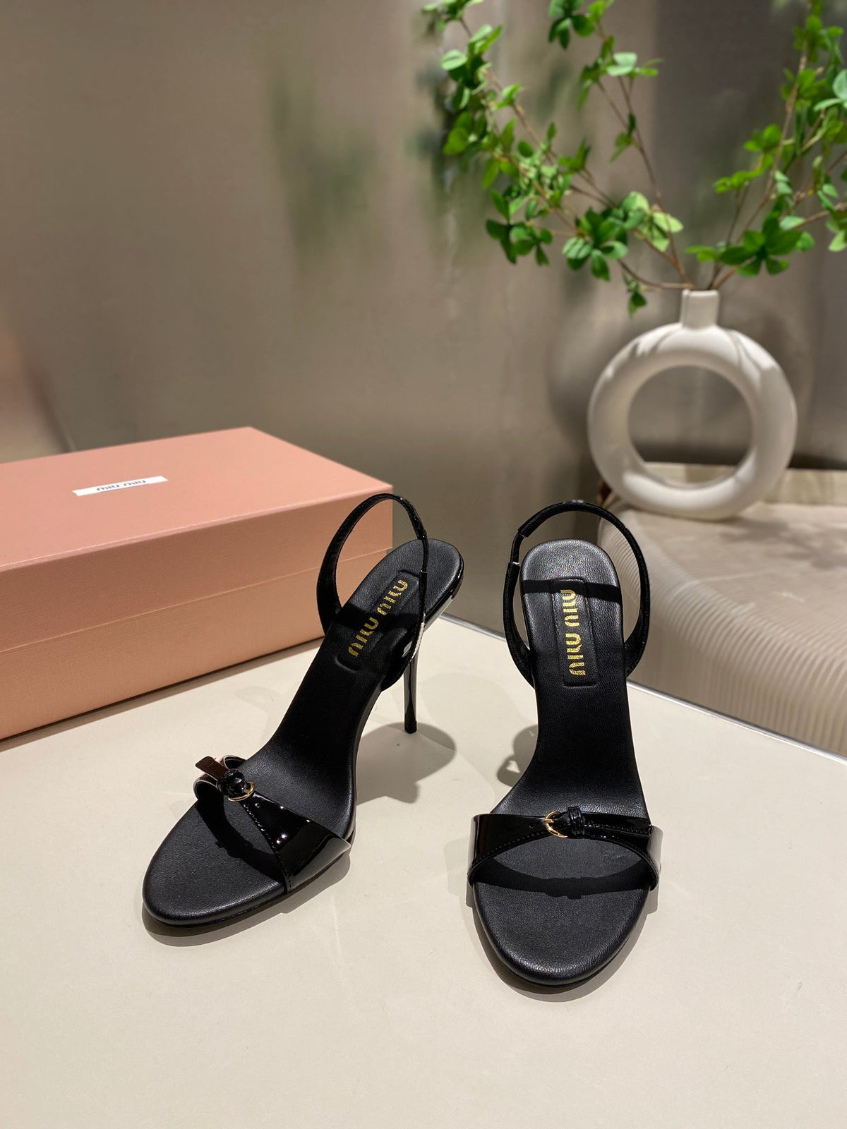 TWO STRAP HIGH HEELED SANDALS IN BLACK GLOSSY SHEEPSKIN